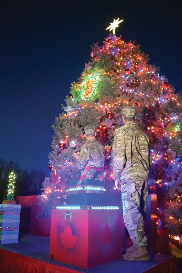 1st Infantry Division leaders officially ushered in the holiday season with the lighting of the holiday tree Dec. 1.