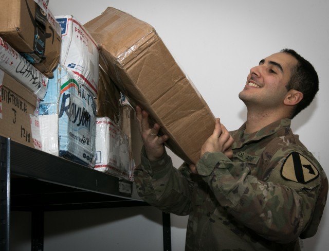 US Soldiers deliver mail, improve morale