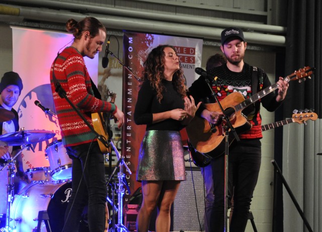 Danika Portz and her band perform on stage