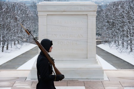 A Tomb Sentinel guards the Tomb of the Unknown Soldier in Arlington National Cemetery, Jan. 30, 2017, in Arlington, Va. The Tomb Sentinels guard the tomb 365 days a year in all weather.