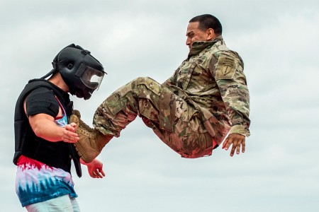 A Soldier demonstrates hand-to-hand combat on a &#34;volunteer&#34; from the crowd during the 6th Ranger Training Battalion&#39;s open house event, April 29, at Eglin Air Force Base, Fla. The event was a chance for the public to learn how Rangers train and operate. The event displays showed equipment, weapons, a reptile zoo, face painting and weapon firing among others. The demonstrations showed off hand-to-hand combat, a parachute jump, snake show and Rangers in action.