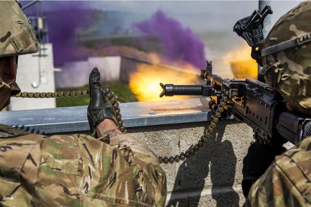 Soldiers of 175th Infantry Regiment National Guard return fire while conducting a town defense scenario during Saber Junction 17 at the Hohenfels Training Area, Germany, May 15, 2017. Saber Junction 17 includes nearly 4,500 participants from 13 NATO and European partner nations.