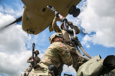 Soldiers assigned to 2nd Cavalry Regiment along with 10th Mountain Combat Aviation Brigade, conduct sling load and air assault training with M777A2 Howitzers, during Saber Strike 2017, at Bemowo Piskie Training Area near Orzysz, Poland, June 7, 2017.