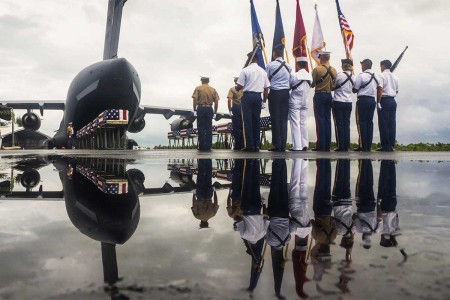 Members of the Defense POW/MIA Accounting Agency (DPAA) conclude a repatriation ceremony for service members missing from the battle of Tarawa, Republic of Kiribati, July 25, 2017. The remains of at least 17 service members were excavated by...