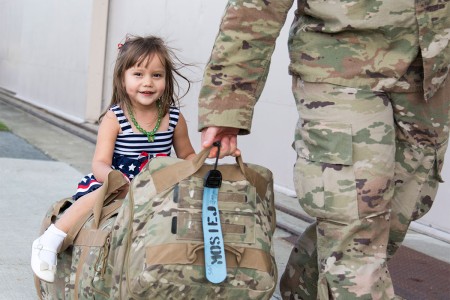 New York Army National Guard Soldiers with the 1156th Engineer Company are reunited with their friends and families as they return from a nine-month deployment to Kuwait and Iraq at Stewart Airport, New Windsor, N.Y., Aug. 31, 2017.