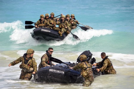 Soldiers assigned to the 25th Infantry Division, make a successful beach landing with their F470 Zodiacs [combat rubber raiding craft] off the coast of Marine Corps Training Area Bellows, Hawaii, Nov. 29, 2017. The Soldiers participated in waterborne training in the Pacific Ocean.