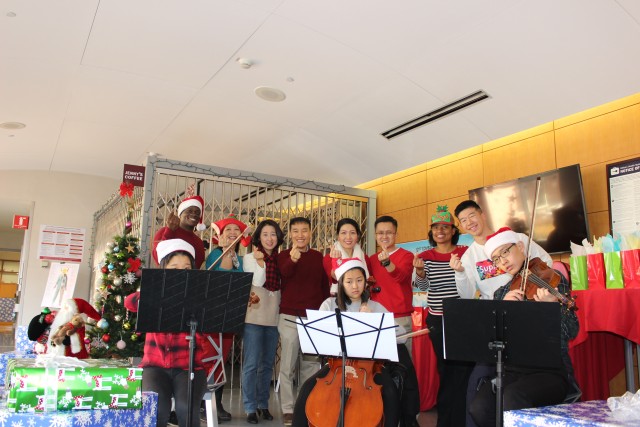 String band playing seasonal gospel songs for the audience