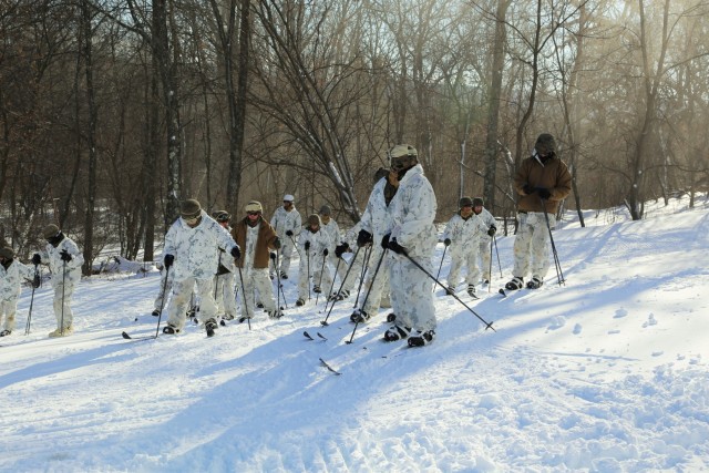 Cold-Weather Operations Course 18-01 students conduct skiing training at Fort McCoy