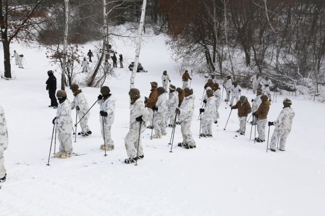 Cold-Weather Operations Course 18-01 students conduct skiing training at Fort McCoy