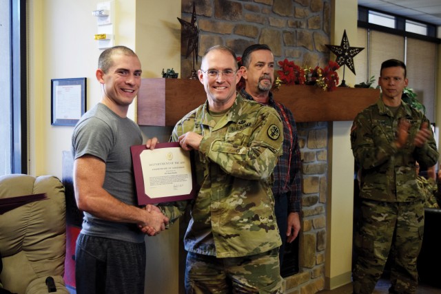 A Fort Riley Warrior Transition Battalion Soldier, Warrior Games athlete was honored for achievements Dec. 15.
