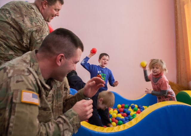 New York Army National Guards Soldiers deployed to Ukraine visits local orphanage