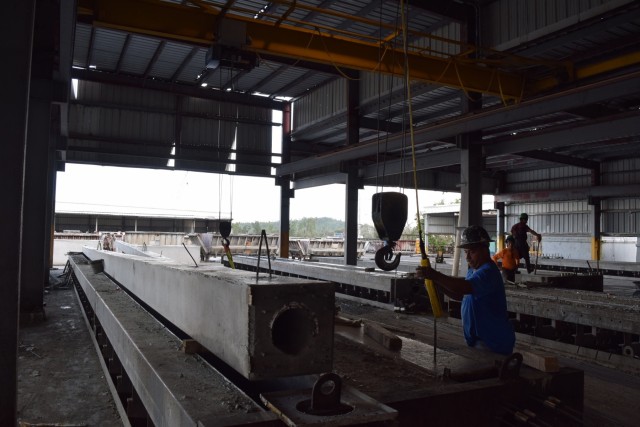 Cement factory delivers critical electrical utility poles to restore native land