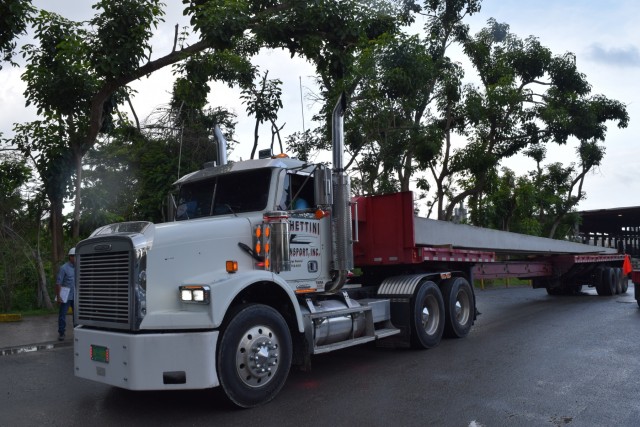 Cement factory delivers critical electrical utility poles to restore native land