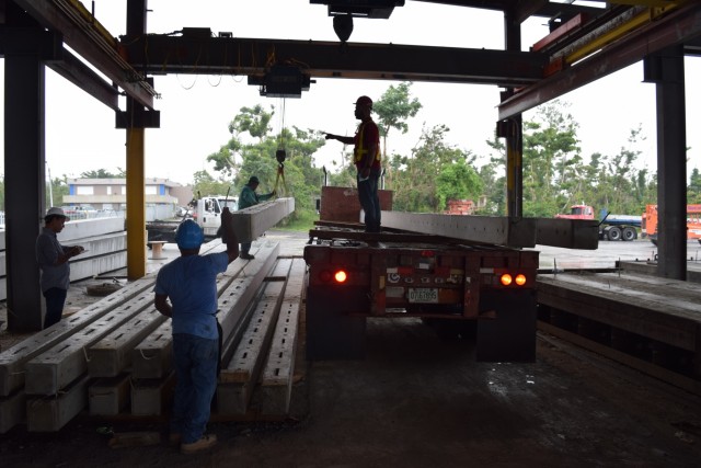Cement factory delivers critical electrical utility poles to restore native land