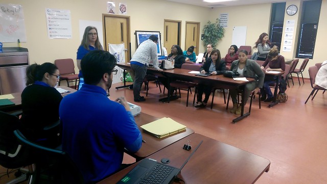 Fort Riley hiring fair brings job seekers and child care needs together.