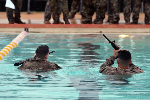 Soldiers perform Combat Water Survival Test