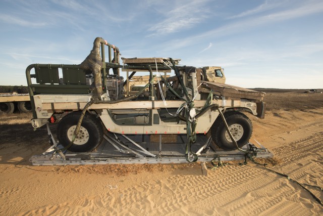 Airborne and Special Operations Test Directorate airdrop tests Modified M-1097 High Mobility Multi-purpose Wheeled Vehicle