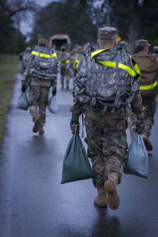 Soldiers Survive Sand Bag Ruck March