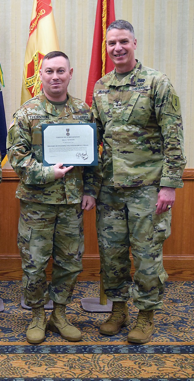 Soldiers recognized by senior leaders at Volunteer of the Quarter ceremony Jan. 30 at Fort Riley's Conference Center