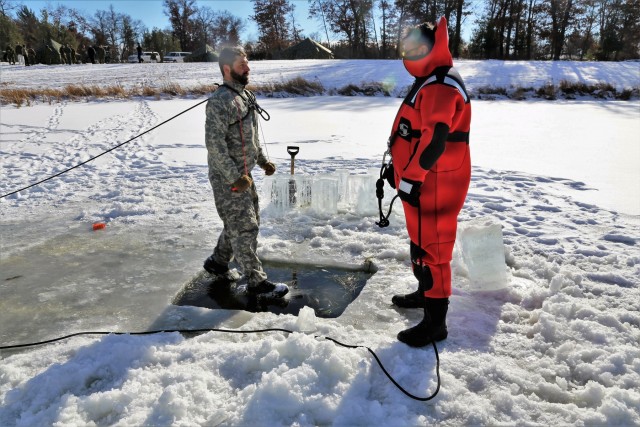 Service members battle icy conditions in cold-water immersion training at Fort McCoy