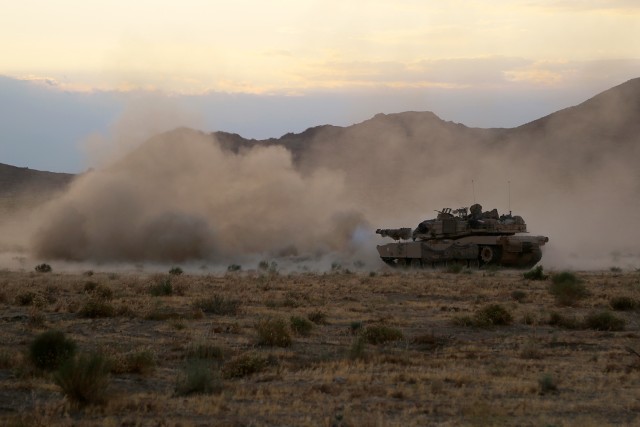 National Training Center soldiers use artillery rounds