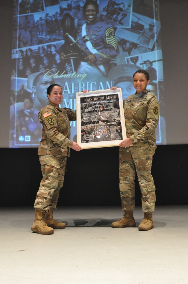 CSM Pitre and COL Summons pose during Black History Month event