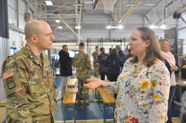 Eleanor Esparza talks to a Soldier during the TASP Rodeo