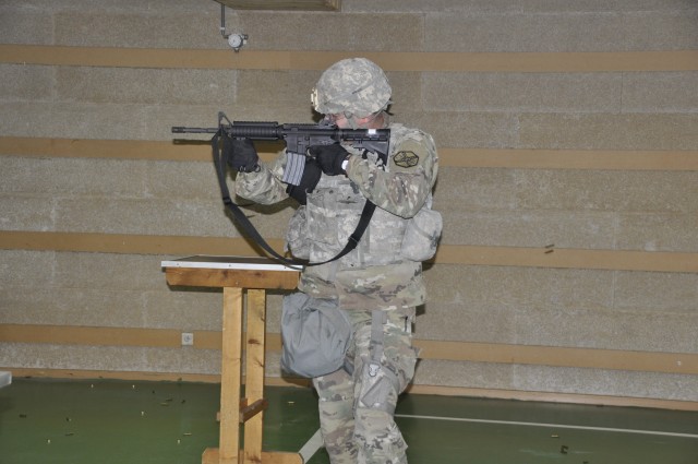 Spc. Matthew White does stress shoot event at Best Warrior Competition