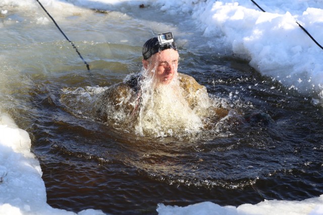 Cold-Weather Operations Course Class 18-04 students complete cold-water immersion training at Fort McCoy