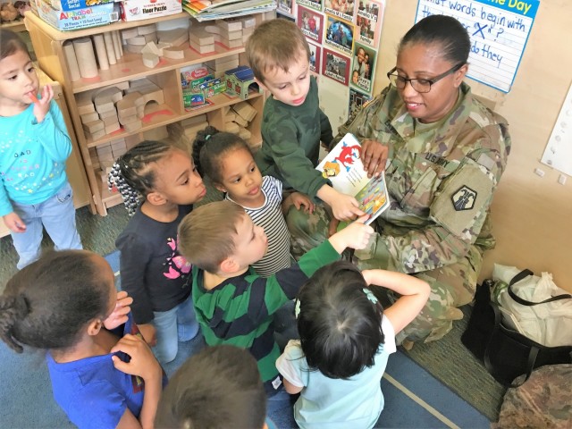 'A little talk about tweedle beetles': 7th MSC Soldiers read to preschoolers