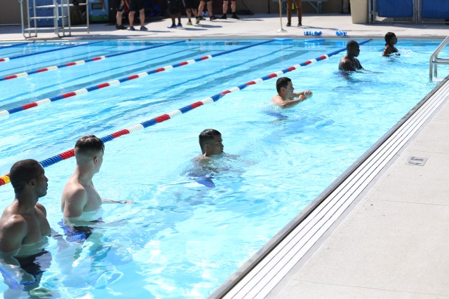 Fort Bliss compete in a swimming challenge