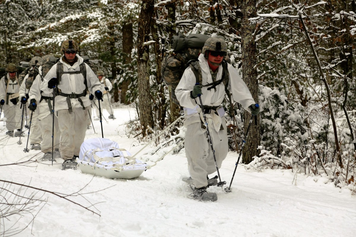 ColdWeather Operations Course students train in snowshoeing, ahkio