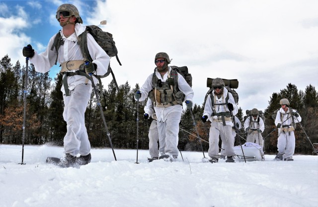 Cold-Weather Operations Course Class 18-06 students practice snowshoeing at Fort McCoy