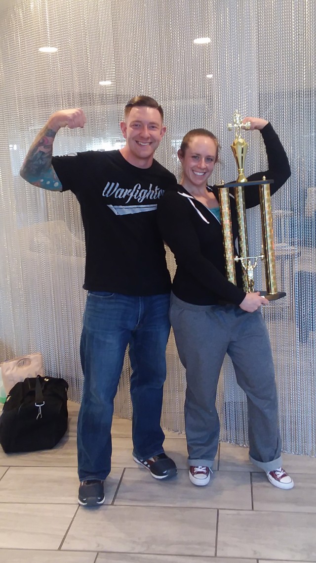 100th Missile Defense Brigade Soldier bench presses, squats and deadlifts her way past competition