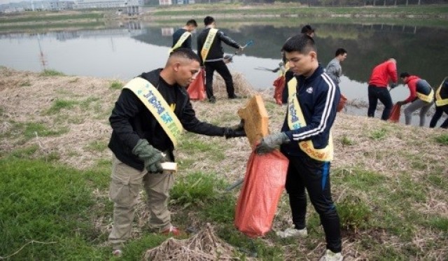 Garrison US military and KATUSA cleanup efforts during Earth Week.