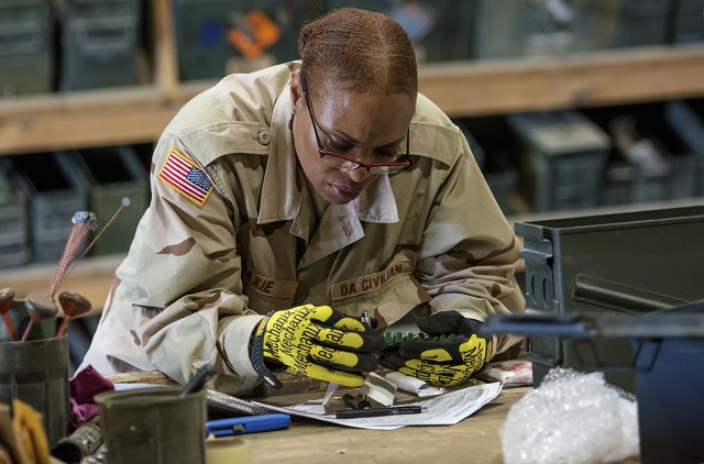 Ammunition quality assurance specialists work to ensure firepower readiness