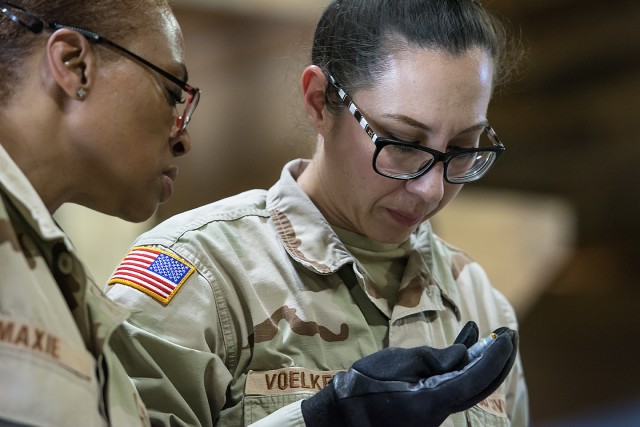 Ammunition quality assurance specialists work to ensure firepower readiness