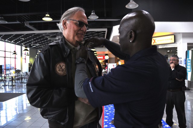 Retired Air Force Col. Hank Keese receives the pin