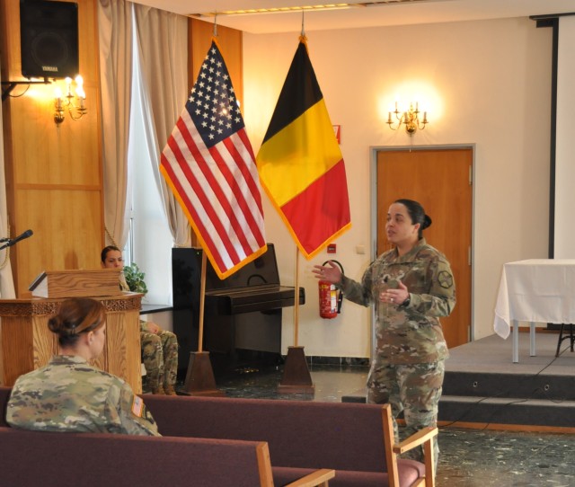 Command Sgt. Maj. Samara Pitre speaks to the audience