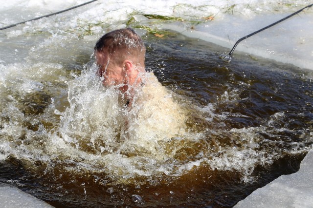 Cold-Weather Operations Course 18-06 students complete cold-water immersion training at Fort McCoy