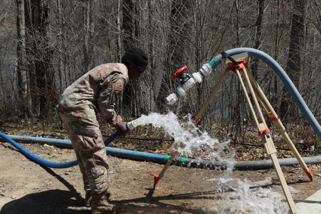 Water purification specialists hydrate soldiers, enhance skills