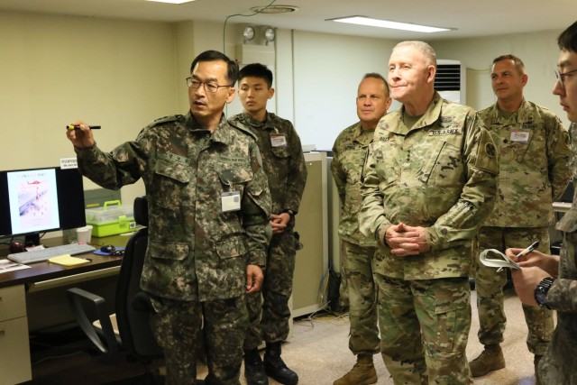 LTG Michael A. Bills and CSM Richard E. Merritt conduct a battle field circulation