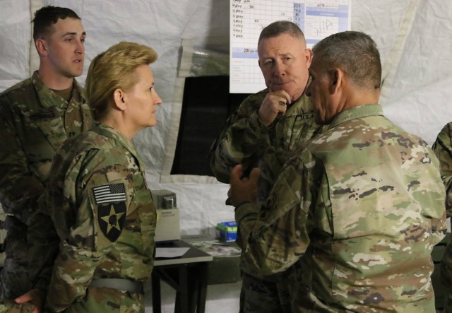 LTG Michael A. Bills and CSM Richard E. Merritt conduct a battle field circulation