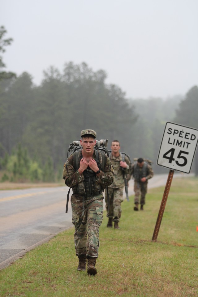 Spc. Musarra during the 12-mile road march