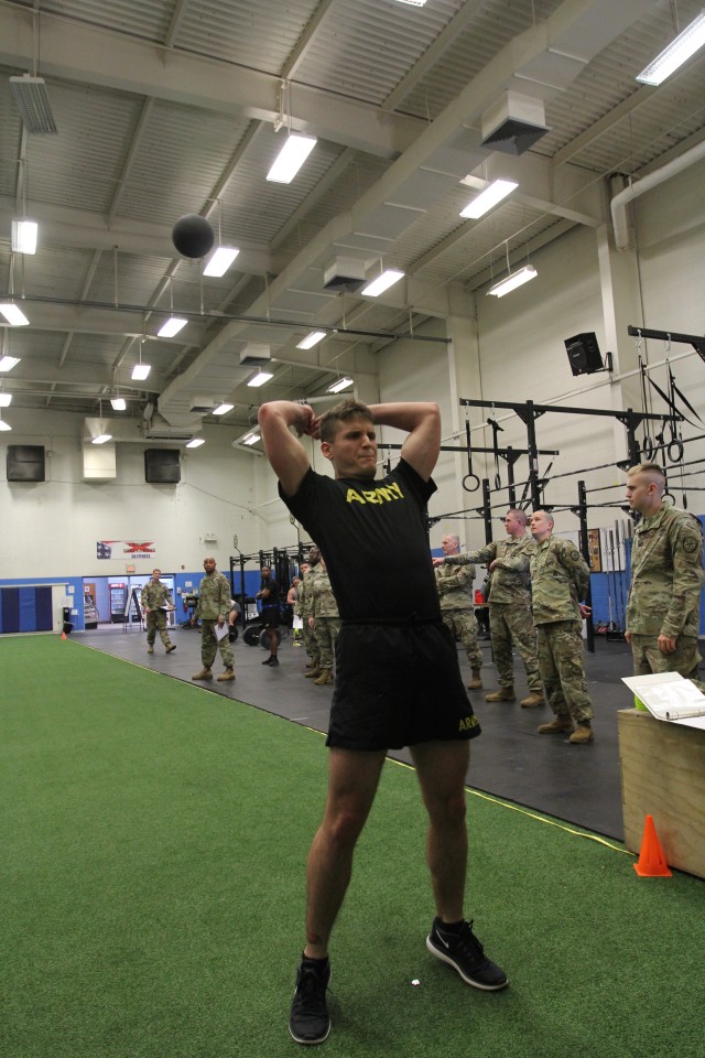 Spc. Musarra competes in the Standing Power Throw event
