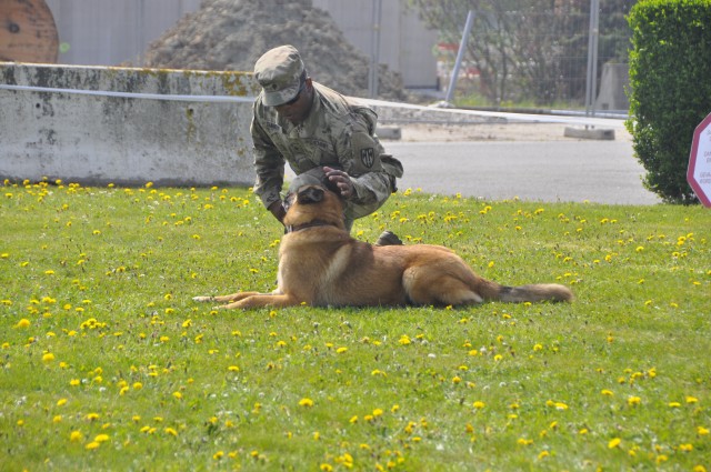 Army Spc. Tahle Teabout and Rex at Kids' Day