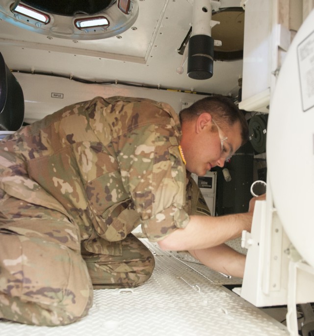 Armored Division Soldiers train on engine, vehicle repair