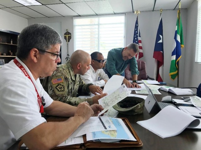 Community liaisons bridge gaps in power restoration