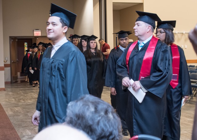 Graduates walk