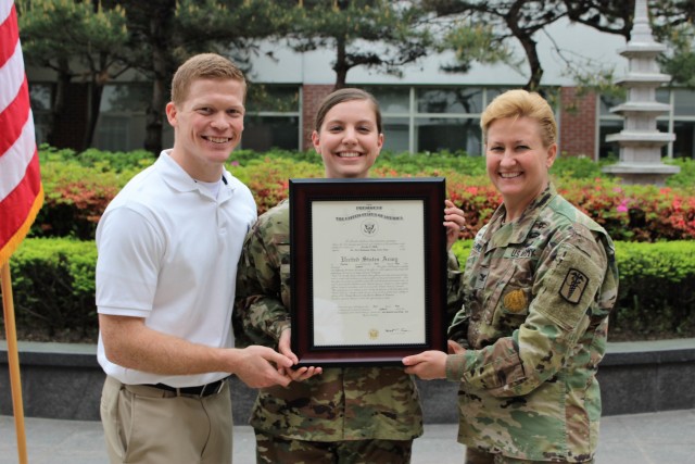 Capt. Jessica Dirks' promotion to Captain presided over by Col. Erica Clarkson, the hospital commander